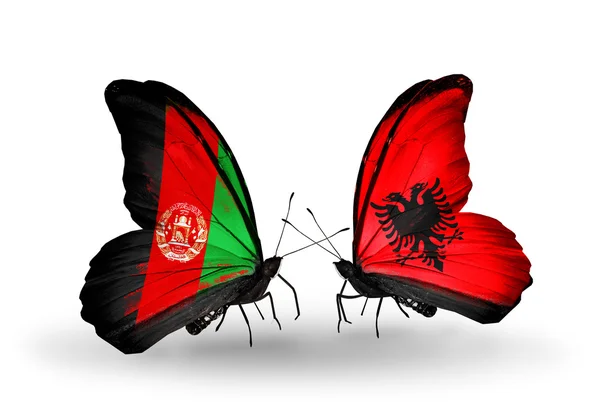 Butterflies with Afghanistan and Albania flags on wings — Stock Photo, Image