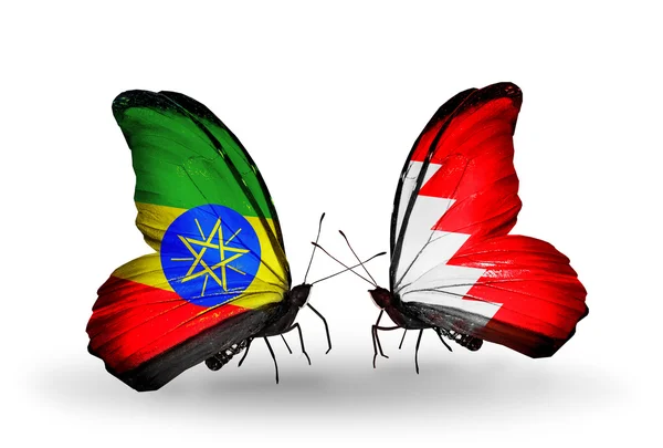 Mariposas con banderas de Etiopía y Bahréin en alas — Foto de Stock