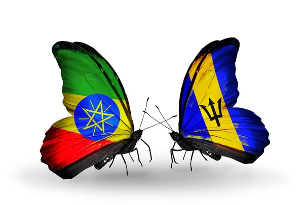 Farfalle con bandiere Etiopia e Barbados sulle ali — Foto Stock