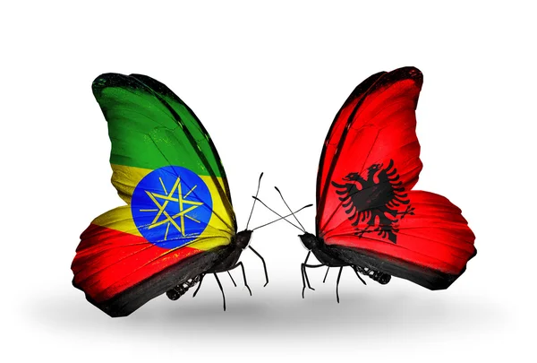 Vlinders met Ethiopië en Albanië vlaggen op vleugels — Stockfoto
