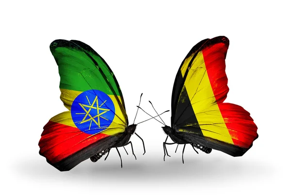 Butterflies with Ethiopia and Belgium flags on wings — Stock Photo, Image