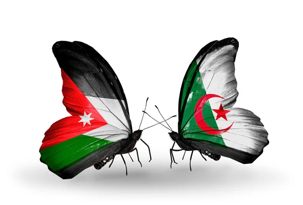 Butterflies with Jordan and Algeria flags on wings — Stock Photo, Image