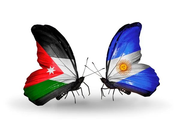 Butterflies with Jordan and Argentina flags on wings — Stock Photo, Image