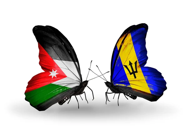 Butterflies with Jordan and Barbados flags on wings — Stock Photo, Image