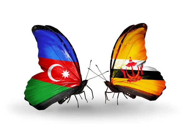 Kelebekler barbados ve brunei bayrağı ile — Stok fotoğraf