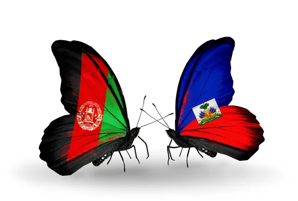 Butterflies with Afghanistan and Haiti flags — Stock Photo, Image