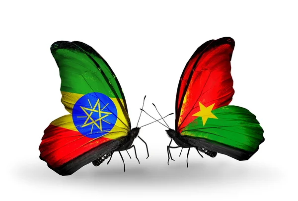 Butterflies with Ethiopia and Burkina Faso flags — Stock Photo, Image