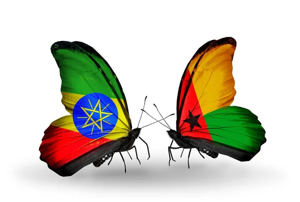 Motyle z Etiopii i Gwinei bissau flagi — Zdjęcie stockowe