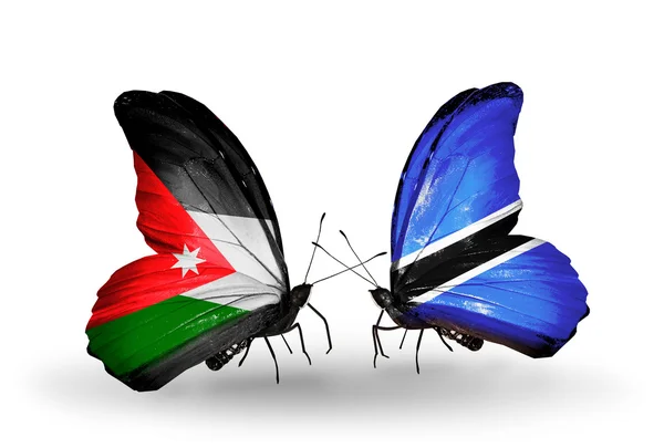 Schmetterlinge mit jordanischen und botswana-Flaggen — Stockfoto