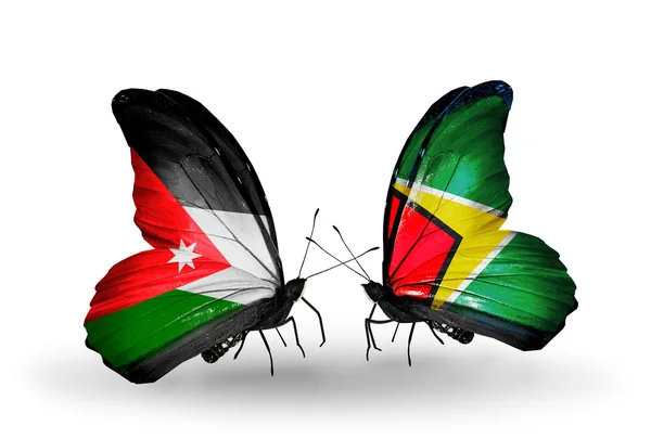 Papillons avec drapeaux Jordanie et Guyane — Photo