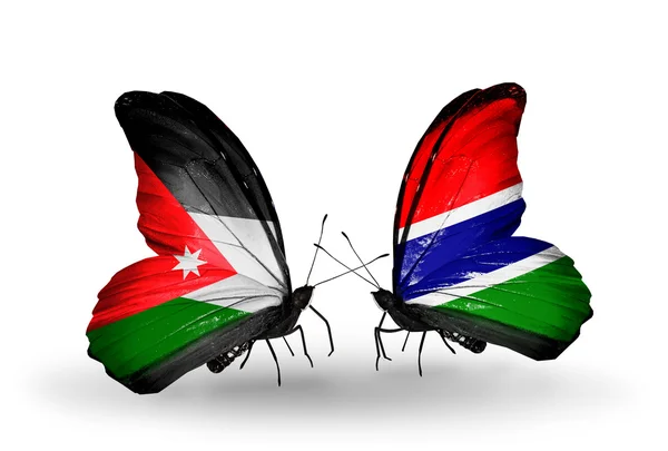 Butterflies with Jordan and Gambia flags — Stock Photo, Image