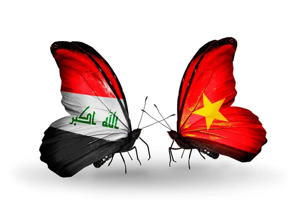 Borboletas com bandeiras do Iraque e do Vietnã — Fotografia de Stock
