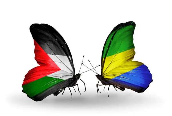 Mariposas con banderas de Palestina y Gabón — Foto de Stock