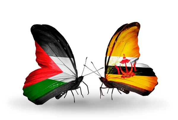 Butterflies with Palestine and Brunei flags — Stock Photo, Image