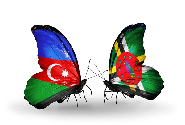 Fjärilar med Azerbajdzjan och dominica flaggor — Stockfoto