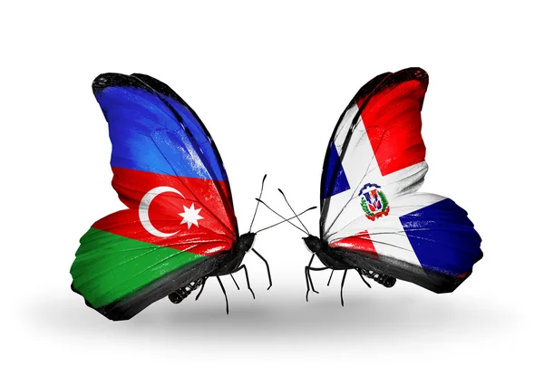 Azerbaycan ve dominicana bayrakları taşıyan kelebekler — Stok fotoğraf