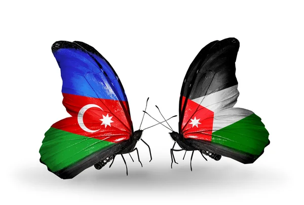 Butterflies with Azerbaijan and Jordan flags — Stock Photo, Image
