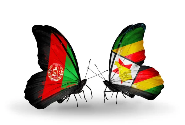 Butterflies with Afghanistan and Zimbabwe flags — Stock Photo, Image