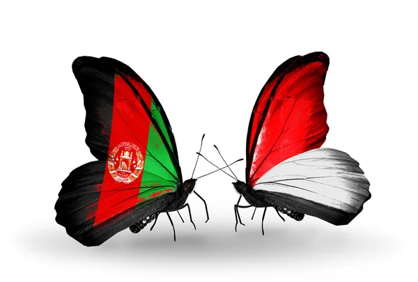 アフガニスタン、モナコ、インドネシア フラグと蝶 — ストック写真