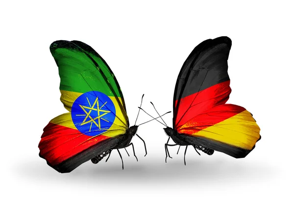 Vlinders met Ethiopië en Duitsland vlaggen — Stockfoto