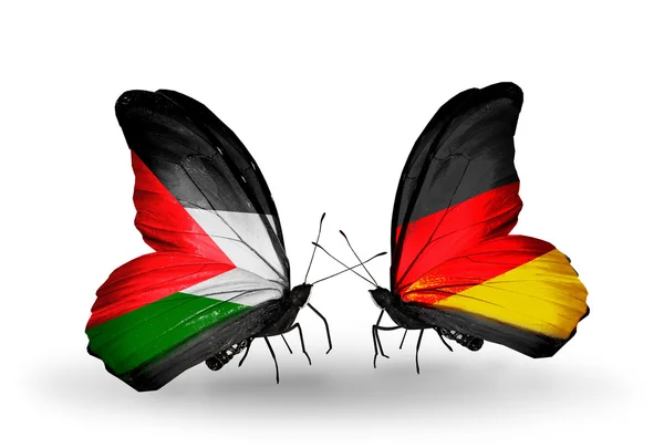 Butterflies with Palestine and Germany flags — Stock Photo, Image