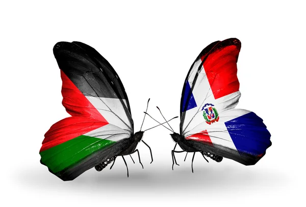 Butterflies with Palestine and Dominicana flags — Stock Photo, Image