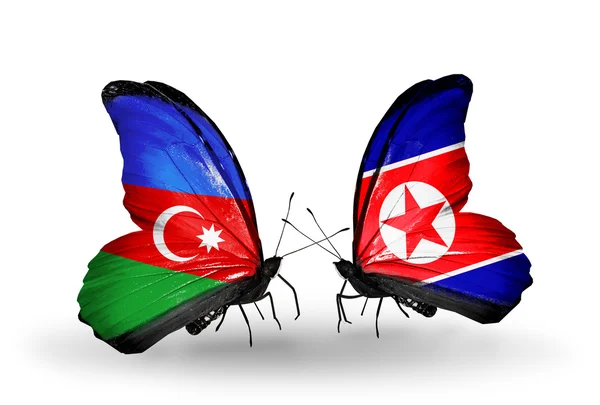 蝴蝶与阿塞拜疆和朝鲜的国旗 — 图库照片