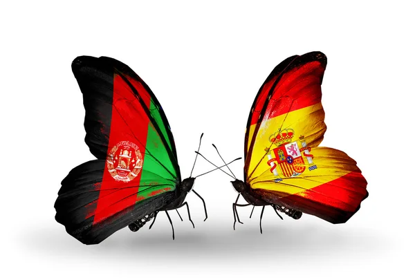 Butterflies with Afghanistan and  Spain flags — Stock Photo, Image