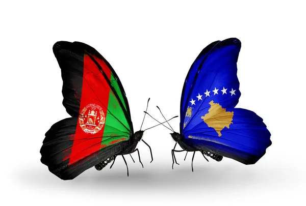 Vlinders met afghanistan en kosovo vlaggen — Stockfoto