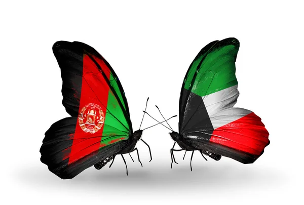 与阿富汗和科威特国旗的蝴蝶 — 图库照片