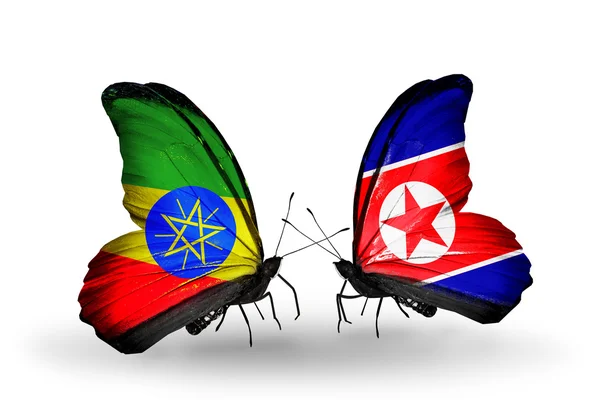 蝴蝶与埃塞俄比亚和朝鲜的国旗 — 图库照片