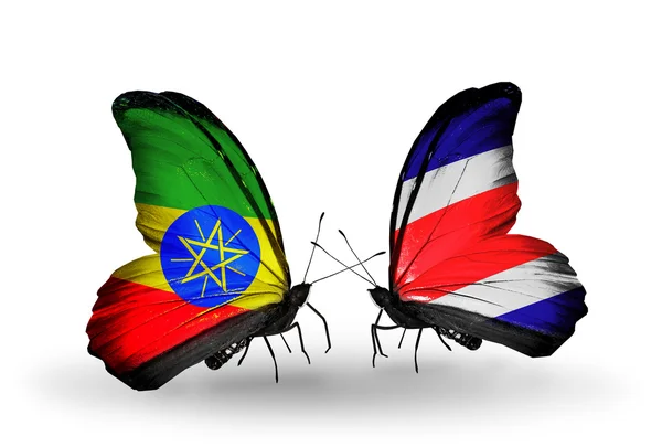 Borboletas com bandeiras da Etiópia e Costa Rica — Fotografia de Stock
