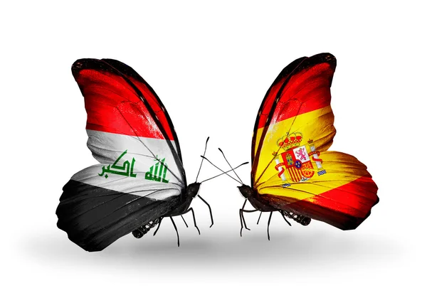 Motyle z Iraku i Hiszpania flagi — Zdjęcie stockowe