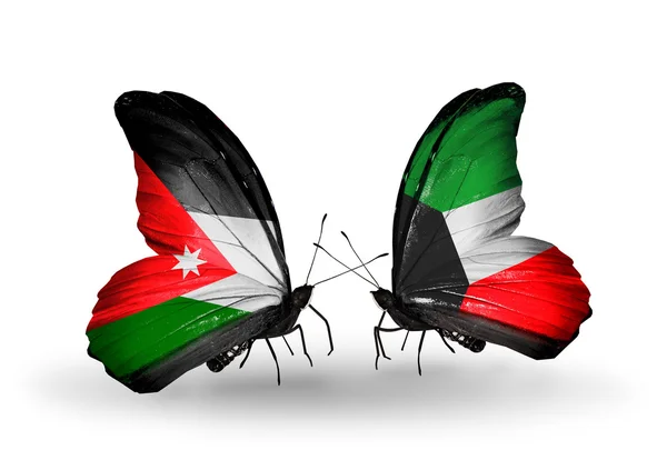 Butterflies with Jordan and Kuwait flags — Stock Photo, Image
