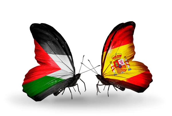 Mariposas con banderas de Palestina y España — Foto de Stock