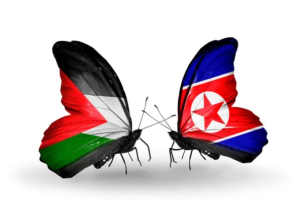 Mariposas con banderas de Palestina y Corea del Norte — Foto de Stock