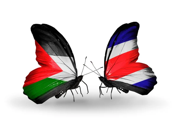 Mariposas con banderas de Palestina y Costa Rica — Foto de Stock
