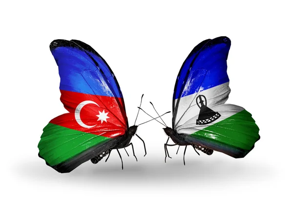 Butterflies with Azerbaijan and  Lesotho flags — Stock Photo, Image