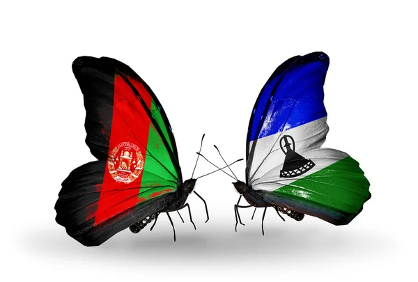 Бабочки с флагами Афганистана и Лесото — стоковое фото