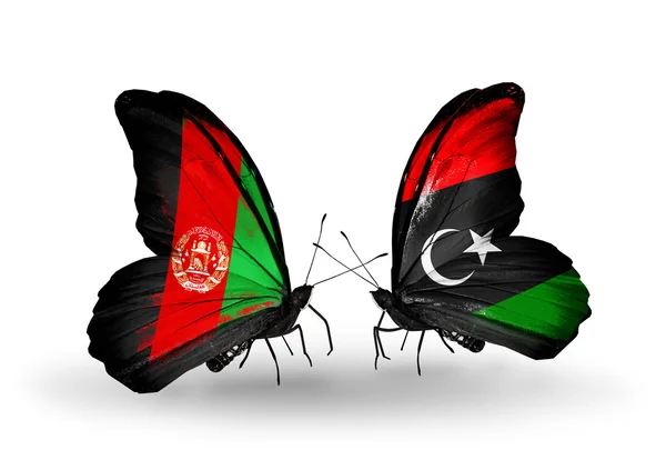 Schmetterlinge mit afghanischen und libyschen Flaggen — Stockfoto