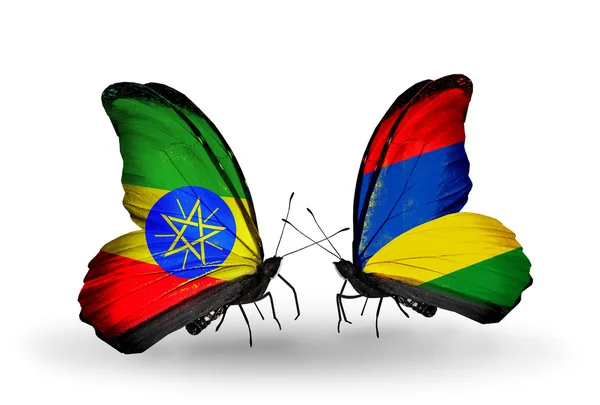 Butterflies with Ethiopia and Mauritius flags — Stock Photo, Image