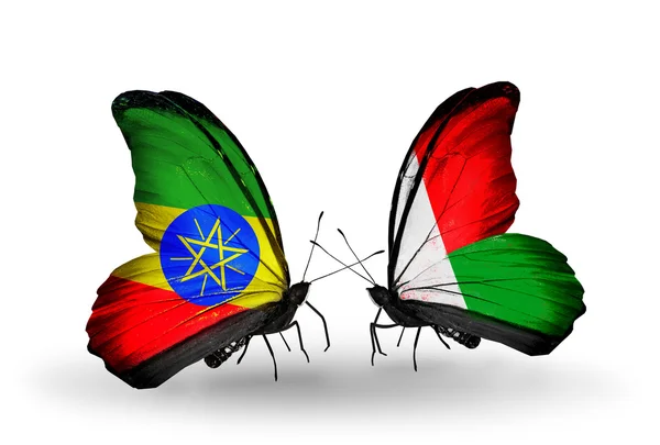 Butterflies with Ethiopia and Madagascar flags — Stock Photo, Image