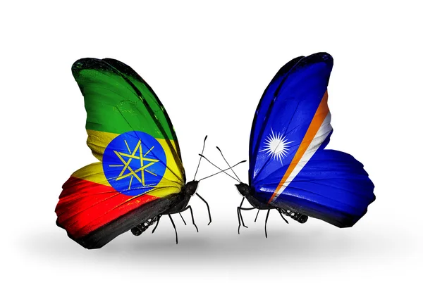 Butterflies with Ethiopia and Marshall islands flags — Stock Photo, Image