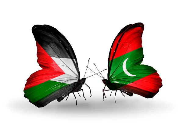Motýli s příznaky Palestiny a Maledivy — Stock fotografie