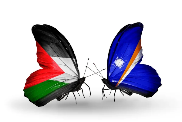 Butterflies with Palestine and Marshall islands flags — Stock Photo, Image