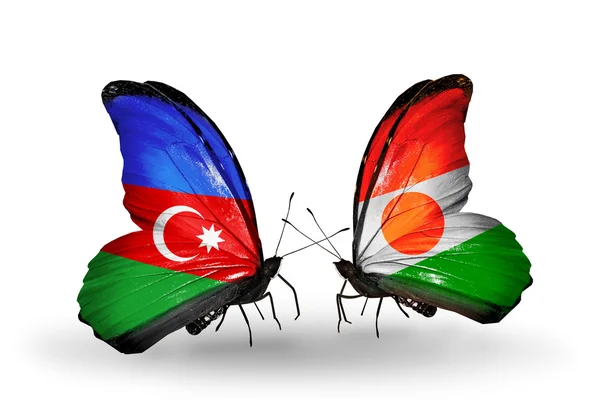 Zwei Schmetterlinge mit Fahnen von Azerbaijan und Niger — Stockfoto