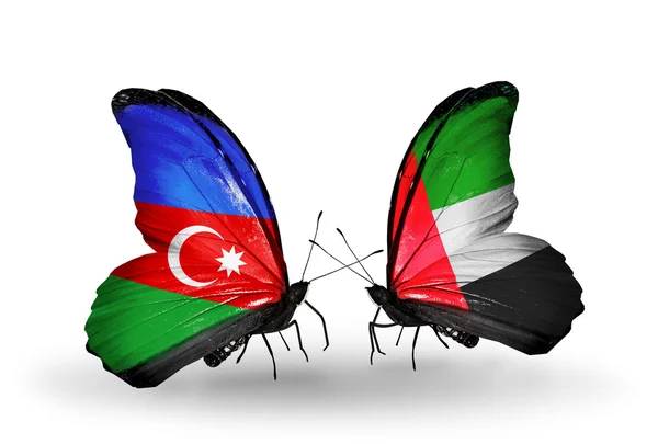 Dos mariposas con banderas de Azerbaiyán y Emiratos Árabes Unidos — Foto de Stock