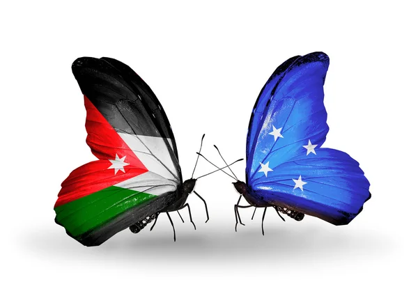 Dos mariposas con banderas de Jordania y Micronesia — Foto de Stock