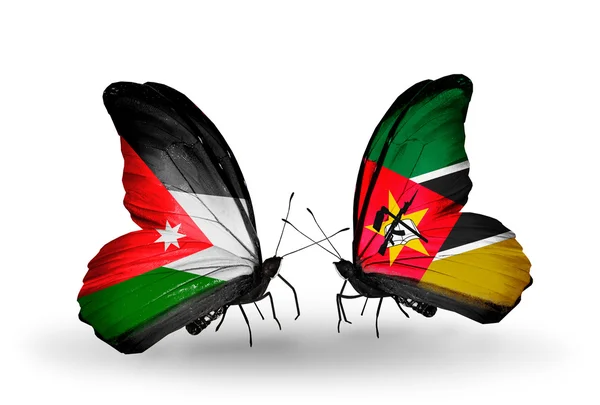 Deux papillons avec des drapeaux de Jordanie et du Mozambique — Photo