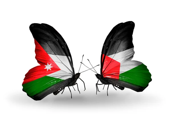 Dos mariposas con banderas de Jordania y Palestina — Foto de Stock